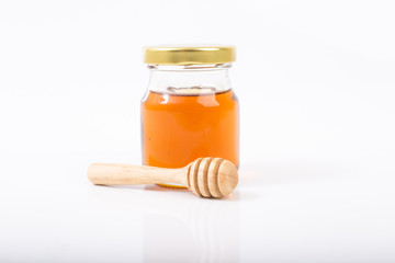 
drizzler dripped in honey with glass jar