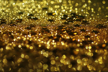 gold stars with glitter bokeh texture abstract background