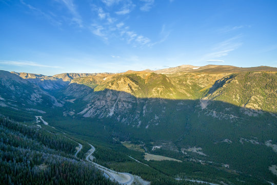 Aerial view of the Beartooth Mountains with a switchback road visible below