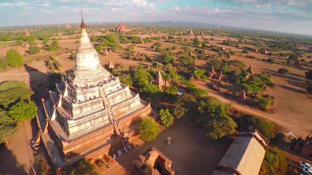 Flying over Shwesandaw Pagoda and Temples in Bagan at evening, Myanmar (Burma), 4k

