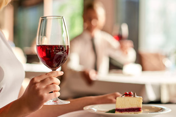 Enjoying glass of wine at the restaurant.