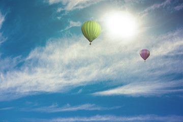 Colorful hot air balloon high in the sky