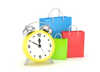 alarm clock and shopping bag (time to buy concept)