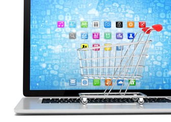 Shopping cart on laptop. 