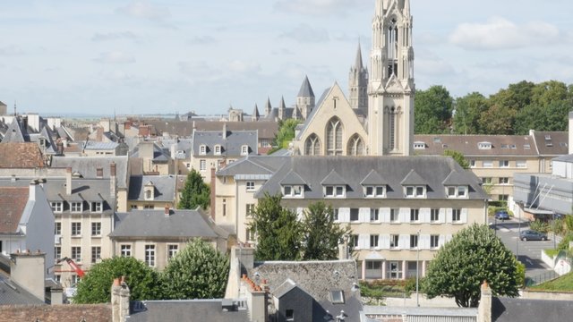 City of Caen located in northern French region Normandy 4K 3840X2160 UltraHD tilt footage - Tilting over cityscape of Calvados capital Caen in France 4K 2160p UHD video 