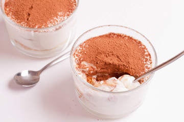Tiramisu, traditional Italian dessert in a glass