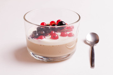 Chocolate dessert panna cotta with currant