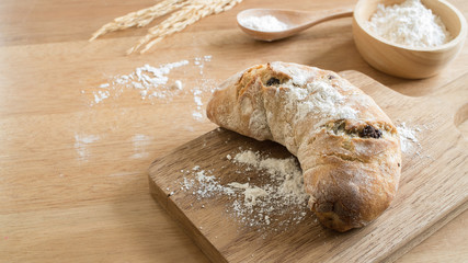 Breakfast, Fresh homemade whole wheat bread on the wooden chopping board