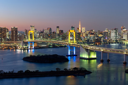 Tokyo Skyline at twilight at the Tokyo Bay,  Rainbow Bridge and Tokyo Tower are visible.