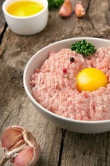 Fototapeta na wymiar Homemade raw minced pork with egg yolk