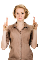 young woman crossing fingers, praying, christening