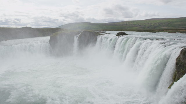 Waterfall Godafoss on Iceland. Famous tourist attractions and landmarks in Icelandic nature landscape. Travel sightseeing on Iceland. RED EPIC SLOW MOTION.
