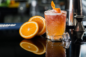Fresh cocktail with orange and ice. Alcoholic, non-alcoholic dri