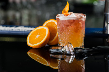 Fresh cocktail with orange and ice. Alcoholic, non-alcoholic dri