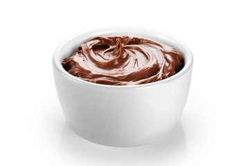 Bowl with chocolate butter isolated on white background.