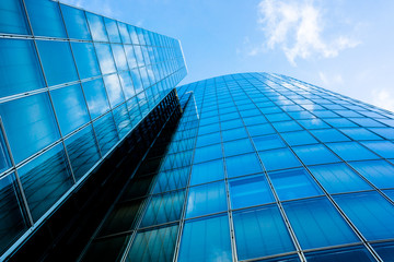 Blue skyscraper facade. office buildings. modern glass silhouett