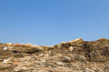 Small hill and rocks against clear blue sky at Khao Laem Ya National park Thailand