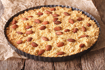  Italian almond cake Sbrisolona close up in baking dish. horizontal 
