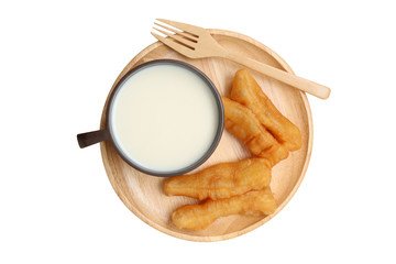 soybean milk and fried doughstick on wood plate