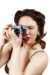 pin up lady in underwear with retro photo camera