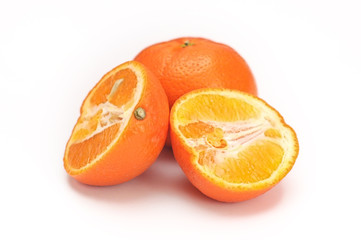 Oranges whole and sliced half fruits isolated on white background