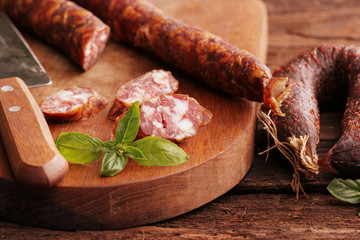 fresh sausage on cutting board