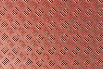 Naklejka premium Czerwony metal teksturowanej powierzchni podłogi.