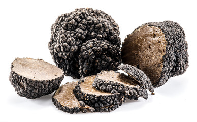 Black truffles isolated on a white background.