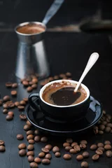 Photo sur Plexiglas Café Cup of coffee, coffee beans and coffee pot
