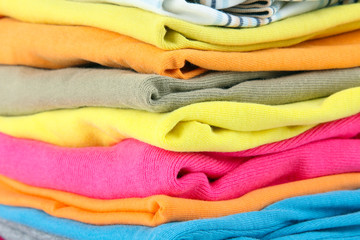 clothes neatly folded and lying on top of each other close up