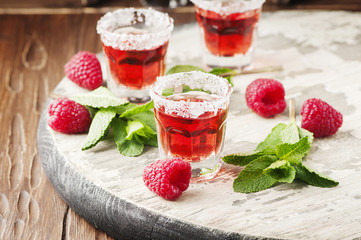 Cold Raspberry drink with mint