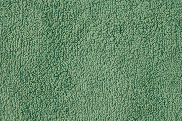 Terry cloth texture. Green towel