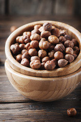 Healthy raw hazelnut on the wooden table