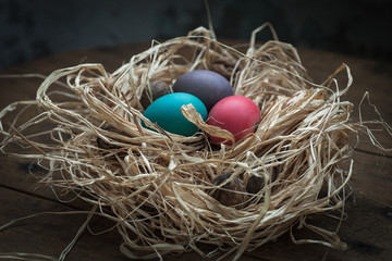 straw nest with eggs