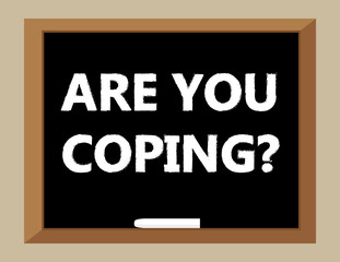 The question Are You Coping in white text on a blackboard 