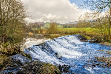 Weir on River Kent, Cumbria, England 