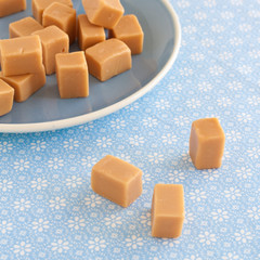 Sweet caramel toffees, fudges on a plate