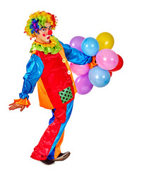 Happy birthday clown man holding bunch of balloons.  Isolated.