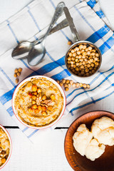 Vegan vegetable casserole with mushrooms, chickpeas and nuts, to