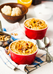 Vegetarian vegetable casserole with mushrooms, chickpeas and nut