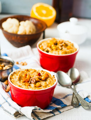 Vegetarian vegetable casserole with mushrooms, chickpeas and nut