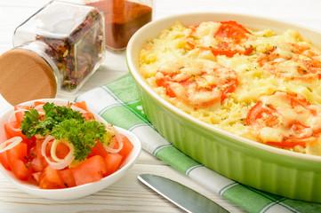 Casserole with minced meat, vegetables and cheese.