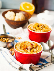 Vegetarian vegetable casserole with mushrooms, chickpeas and nut