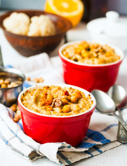 Vegetarian vegetable casserole with mushrooms, chickpeas and nut