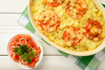 Casserole with minced meat, vegetables and cheese.