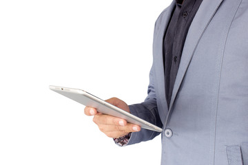 businessman in suit, shirt and tie holding a tablet computer on white background