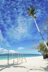 puka beach sign on tropical boracay island philippines