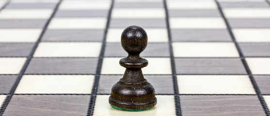 a pawn on a chessboard