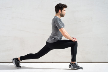 Man stretching quadriceps