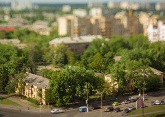 Fototapeta na wymiar Natural (non-imitation) tilt shift blurry photo. Macro-look cityscape.